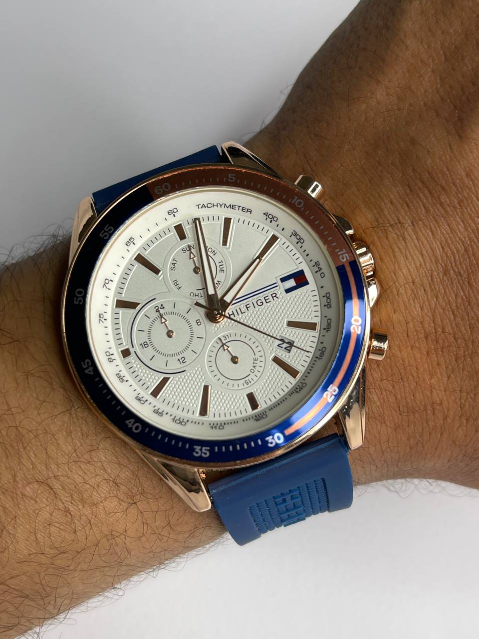 Tommy–Blue Rubber Strap Rose Gold Case White Dial
