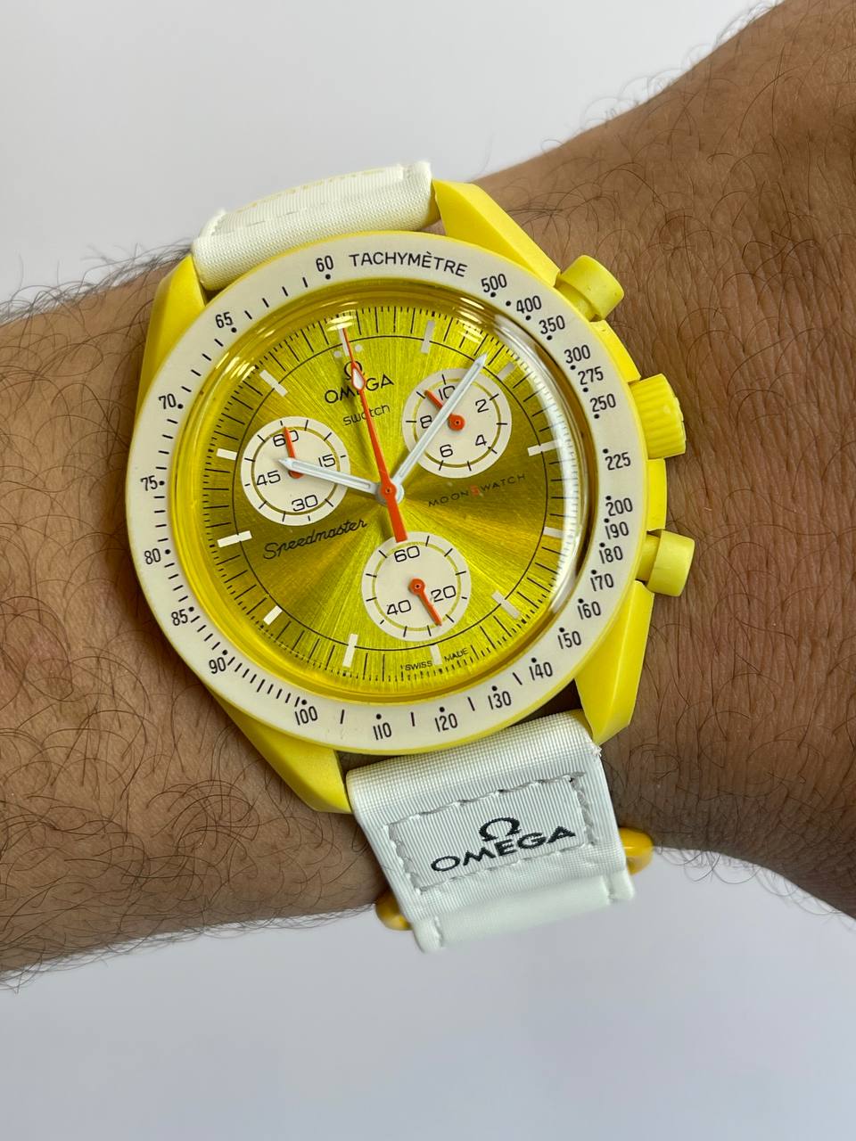 Omega Swatch–Yellow case white fabric strap